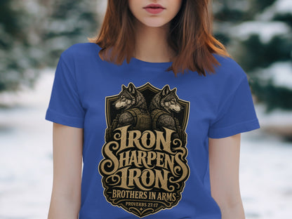 Blue t-shirt with "Iron Sharpen Iron Brothers in Arms Proverbs 27:17" graphic and wolves.