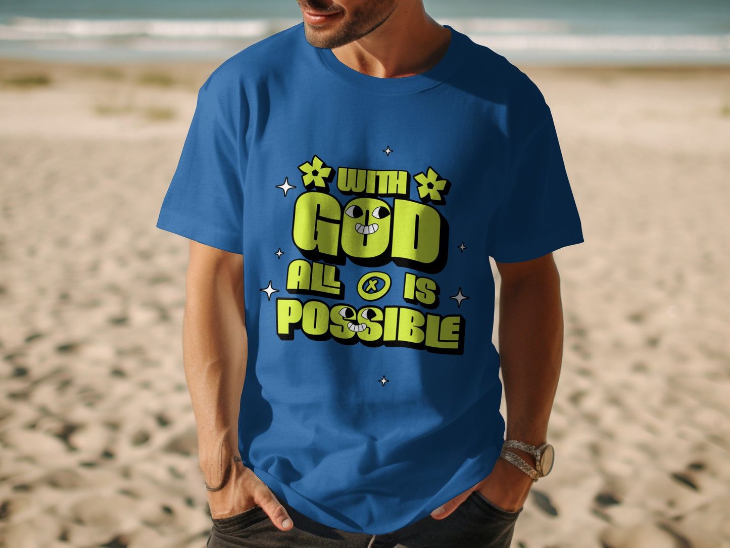 Blue t-shirt with text "WITH GOD ALL IS POSSIBLE" and cartoon faces.
