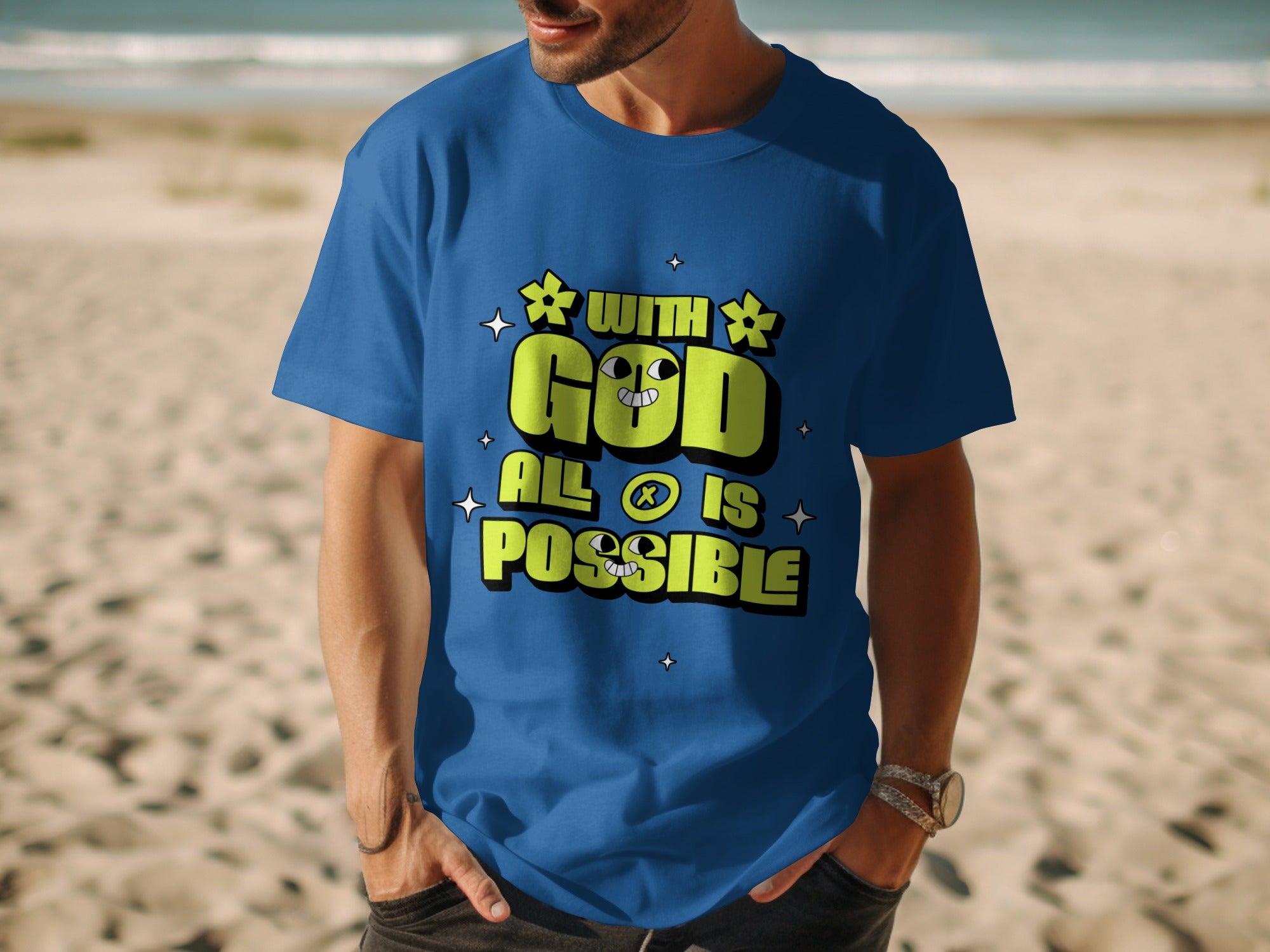 Blue t-shirt with text "WITH GOD ALL IS POSSIBLE" and cartoon faces.