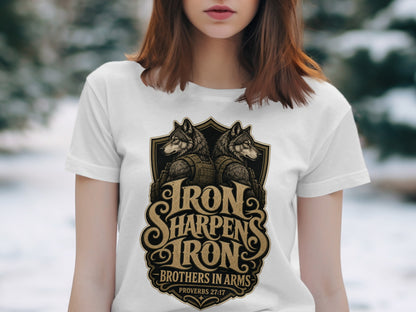 White t-shirt with a shield design featuring two wolves and the text "Iron Sharpen's Iron"