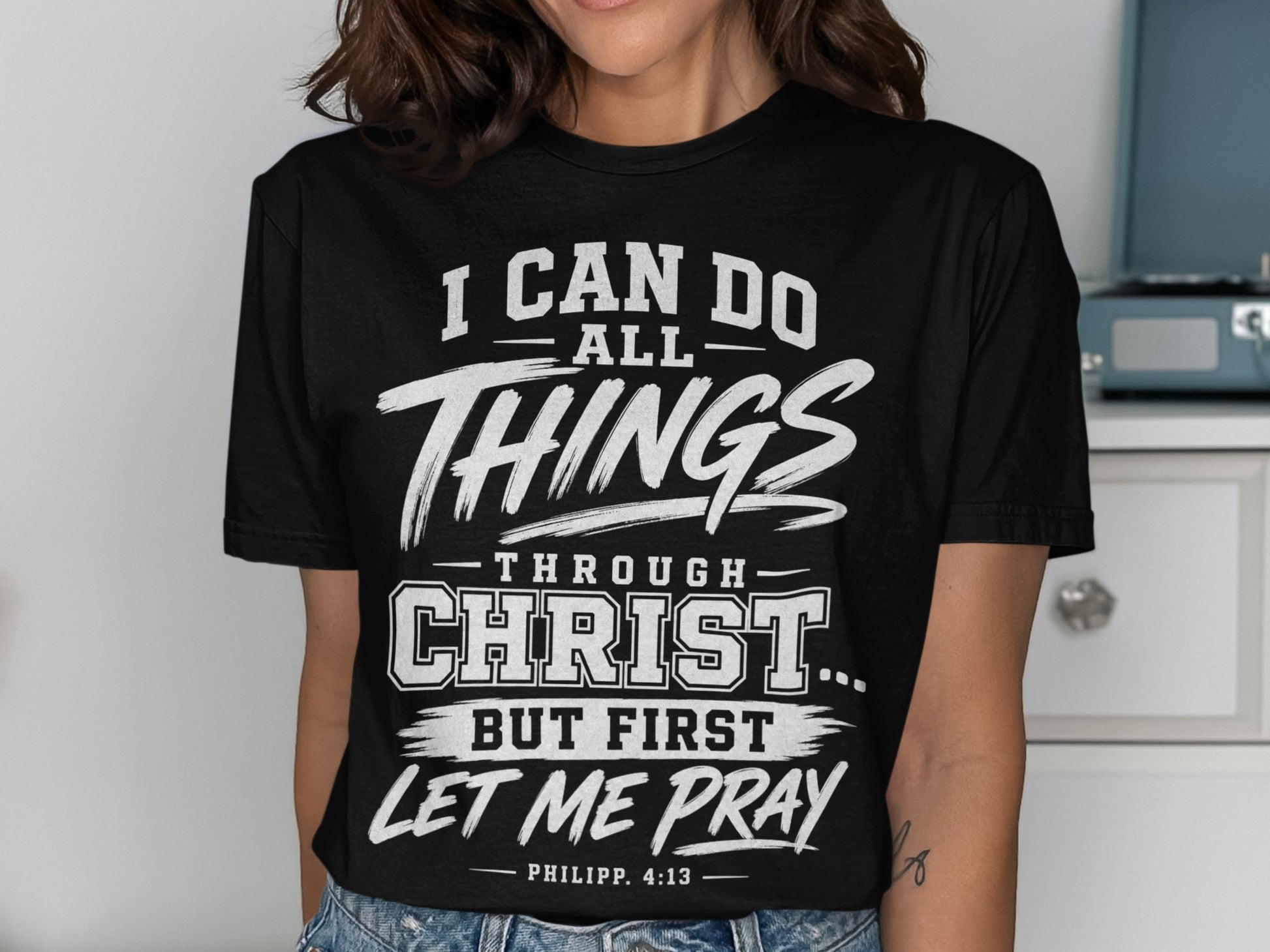 Black t-shirt with "I CAN DO ALL THINGS THROUGH CHRIST... BUT FIRST LET ME PRAY PHILIPP. 4:13" text.
