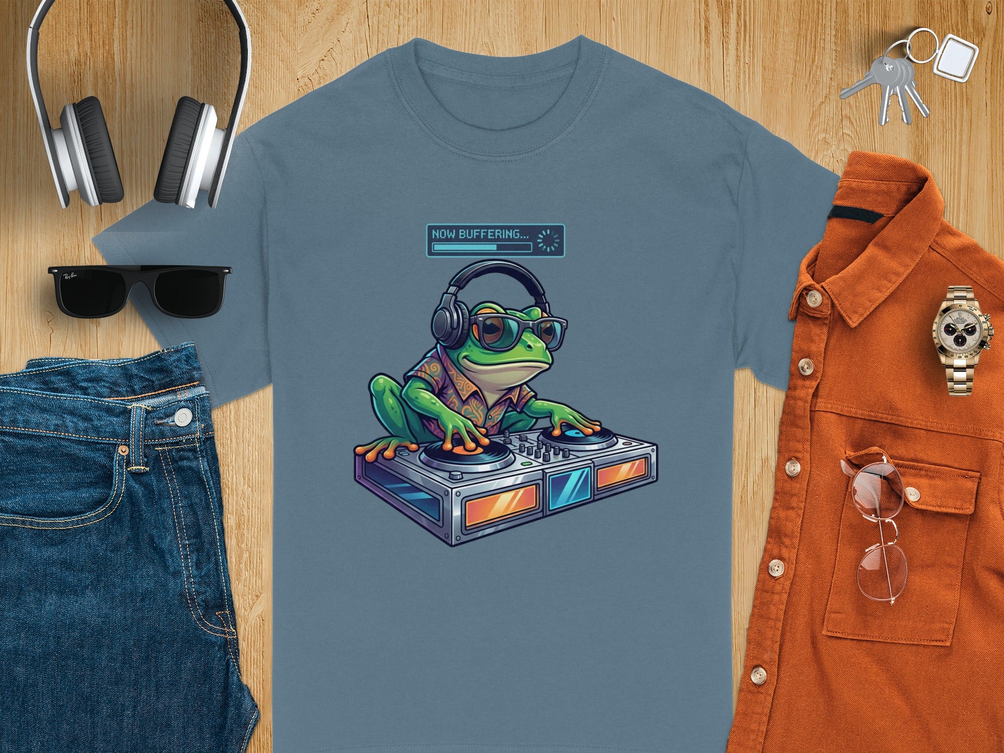 Green frog DJ wearing headphones and sunglasses with "Now Buffering..." text.