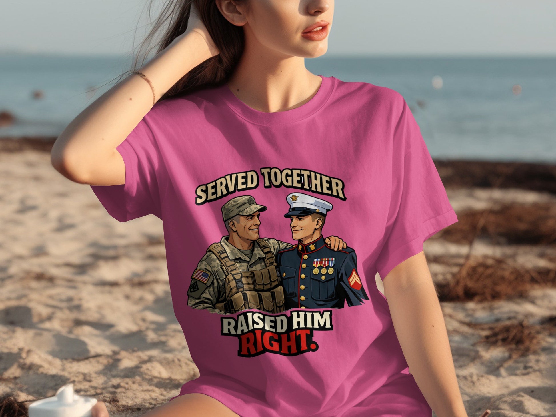 Pink t-shirt with illustration of two smiling soldiers and text "SERVED TOGETHER RAISED HIM RIGHT".