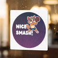 Orange cat wearing headband playing pickleball, "Nice Smash!" text.