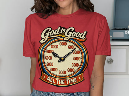 Red shirt with "God Is Good" and clock graphic reading "GOOD" instead of numbers.