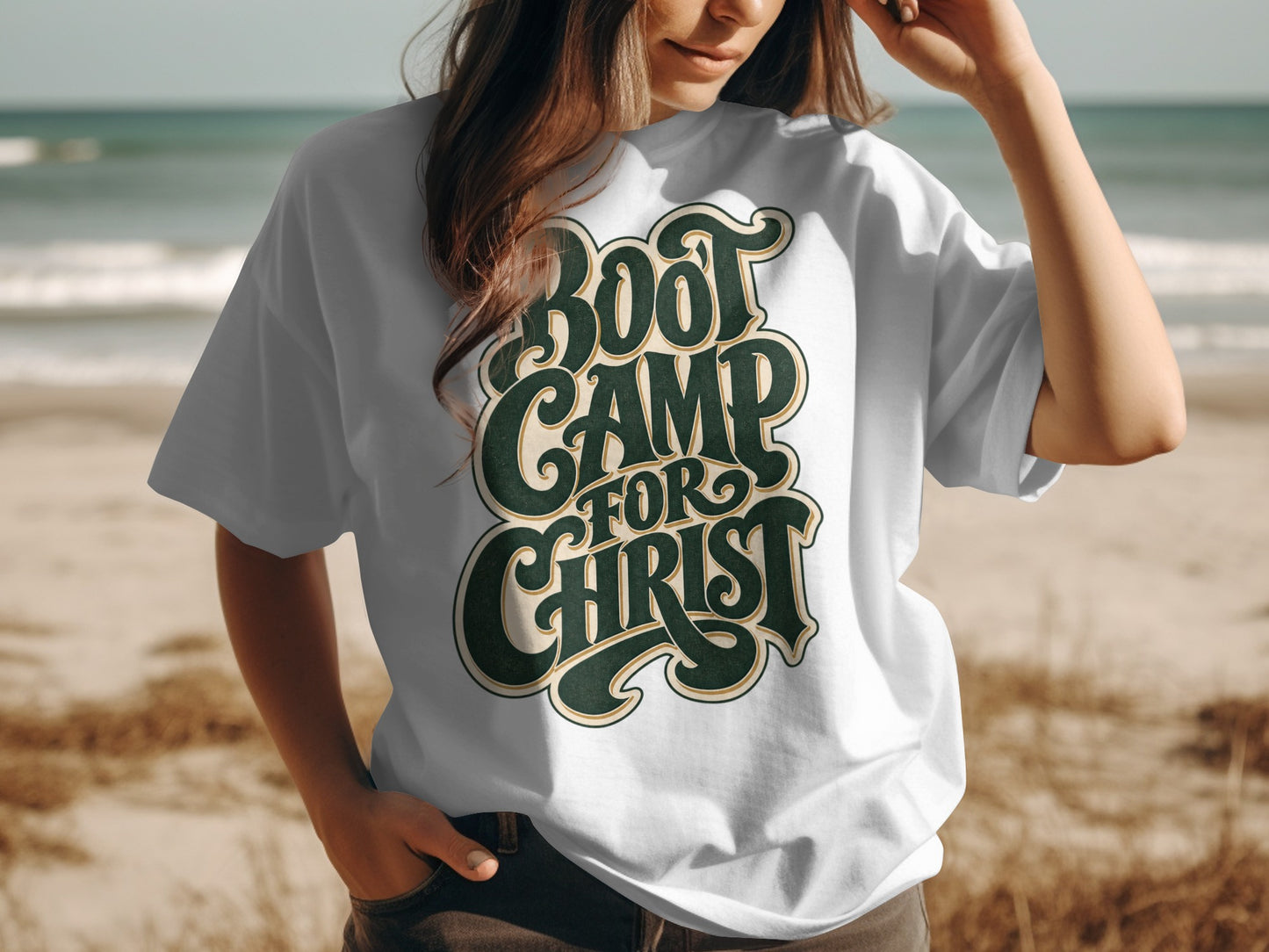 White t-shirt with "Boot Camp For Christ" text on a beach background.