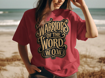 Red t-shirt with "Warriors of the Word (W.O.W.)" text in gold and black lettering.