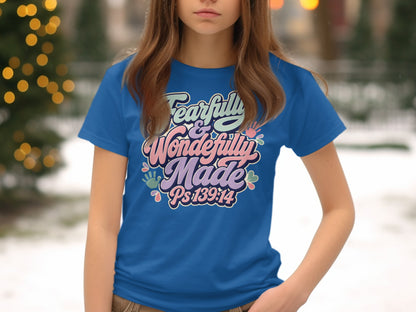 Blue t-shirt with "Fearfully & Wonderfully Made Ps 139:14" text in colorful font.