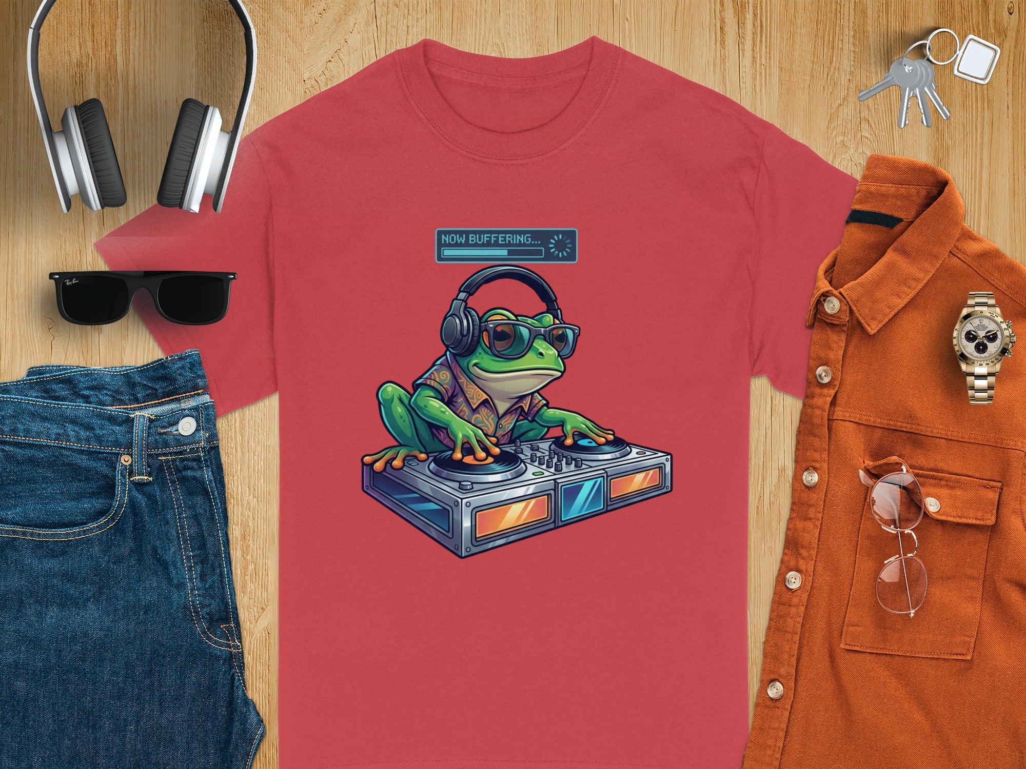 Red t-shirt graphic with a frog DJ wearing headphones and sunglasses.