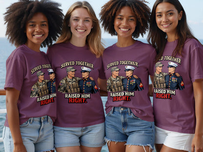 Four women in purple shirts showing a graphic of two military men titled "Served Together Raised Him Right."