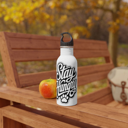 White water bottle with "Stay Hungry" text and paw print on a wooden bench.