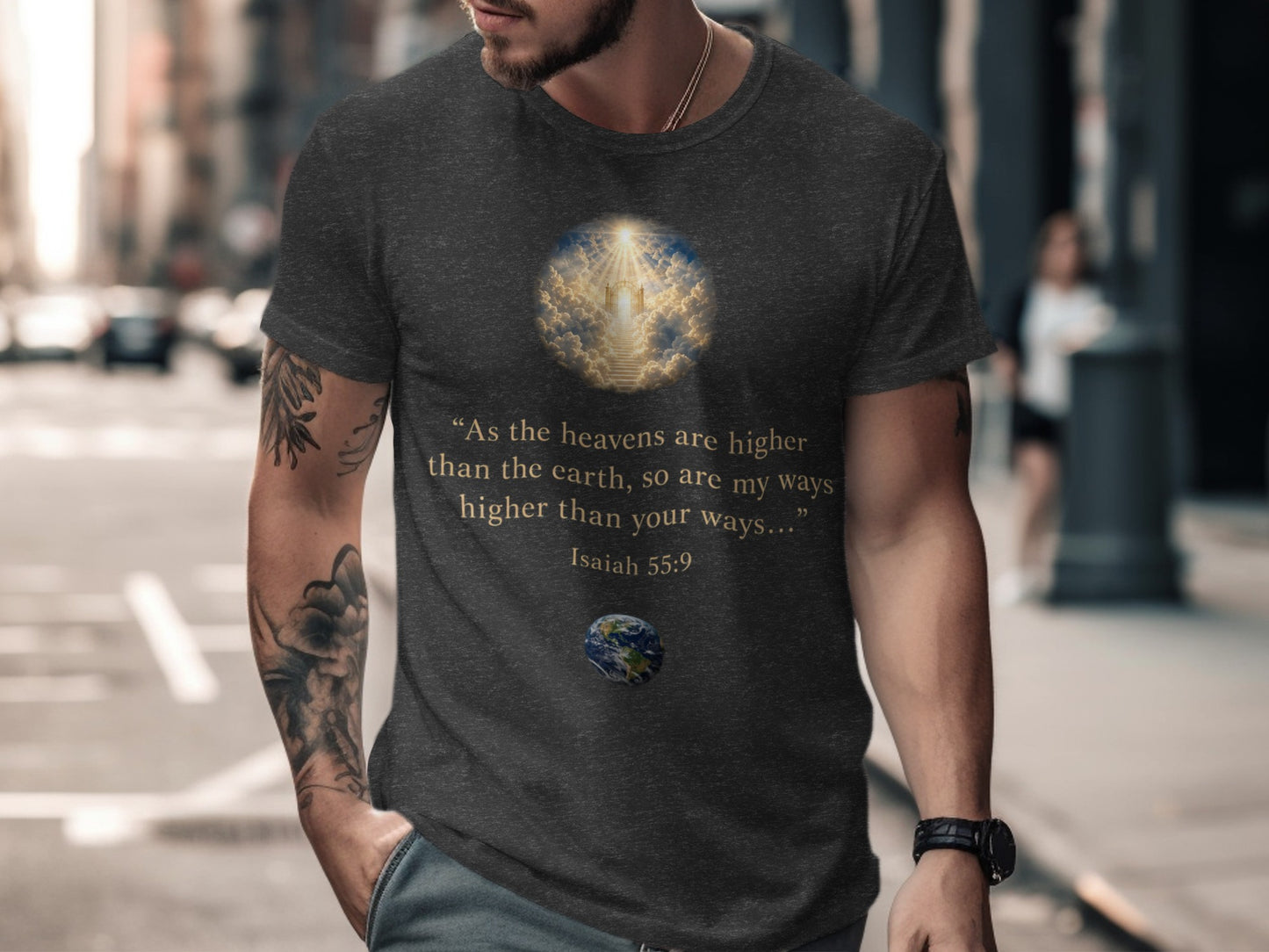 Dark t-shirt with text "As the heavens are higher than the earth, so are my ways higher than your ways... Isaiah 55:9" and imagery.