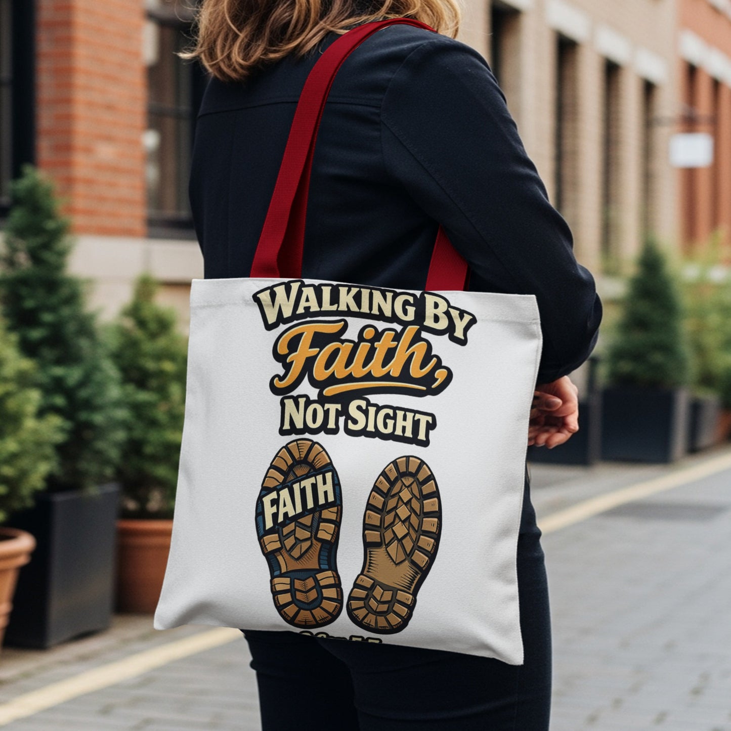 Tote bag with "Walking By Faith, Not Sight" and boot prints saying "FAITH".
