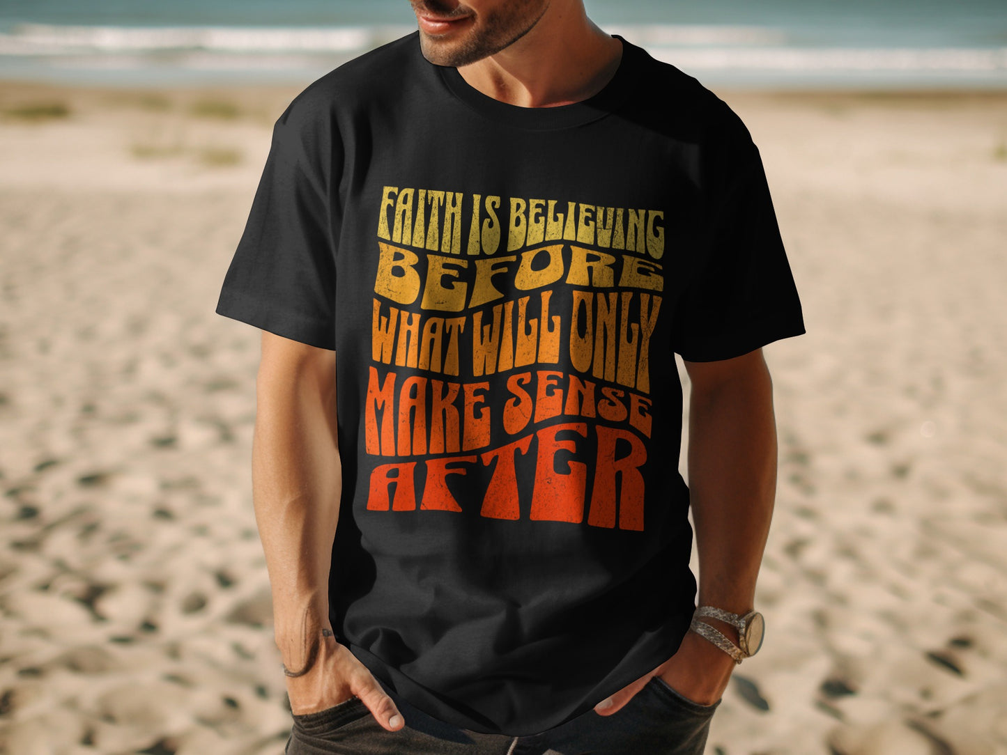 Black t-shirt with wavy text: Faith is believing before what will only make sense after.