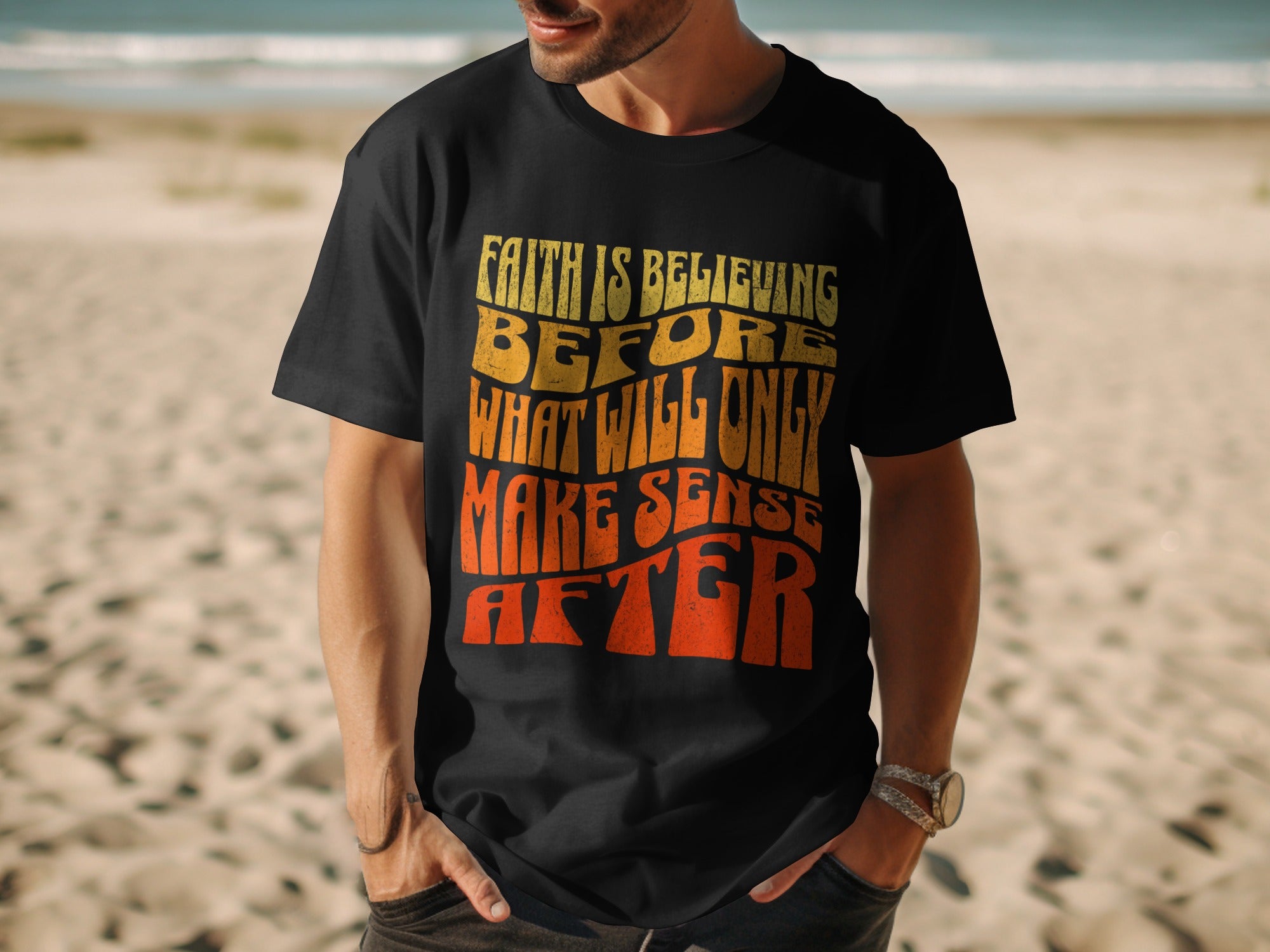 Black t-shirt with wavy text: Faith is believing before what will only make sense after.