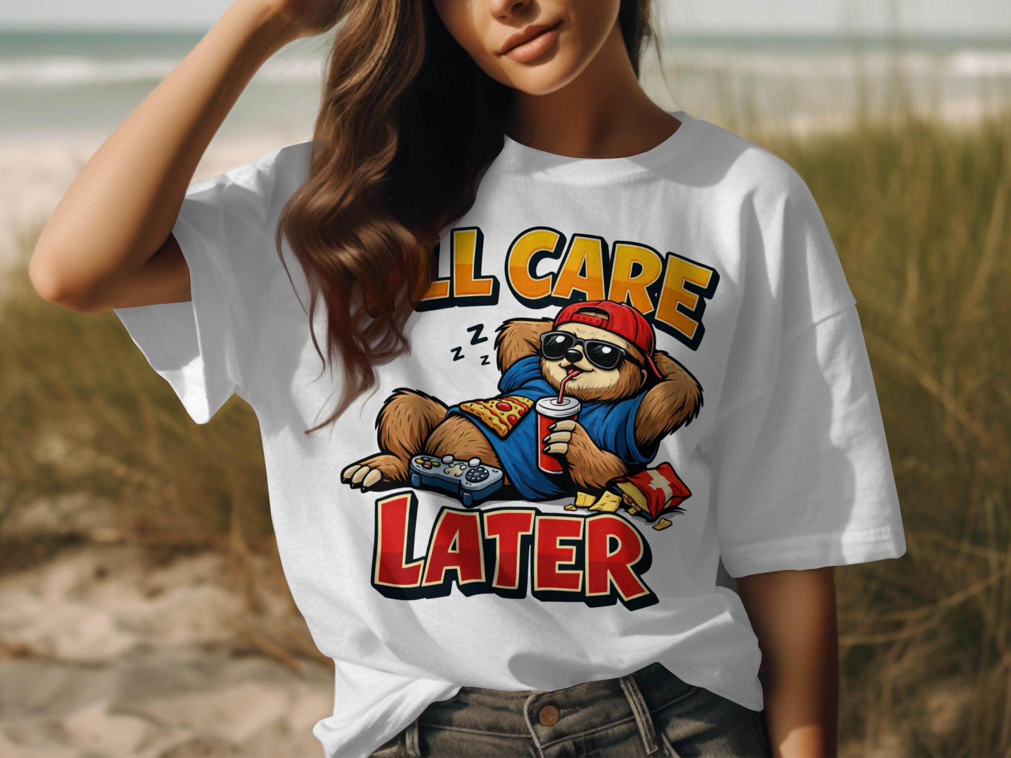 T-shirt graphic with sloth, gaming controller, drinks, and text "I'LL CARE LATER."