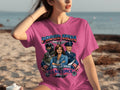 Proud Mom of sons that served in the U.S. Air Force graphic on pink shirt.