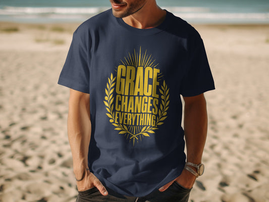Navy t-shirt with yellow text "GRACE CHANGES EVERYTHING" inside a laurel wreath.