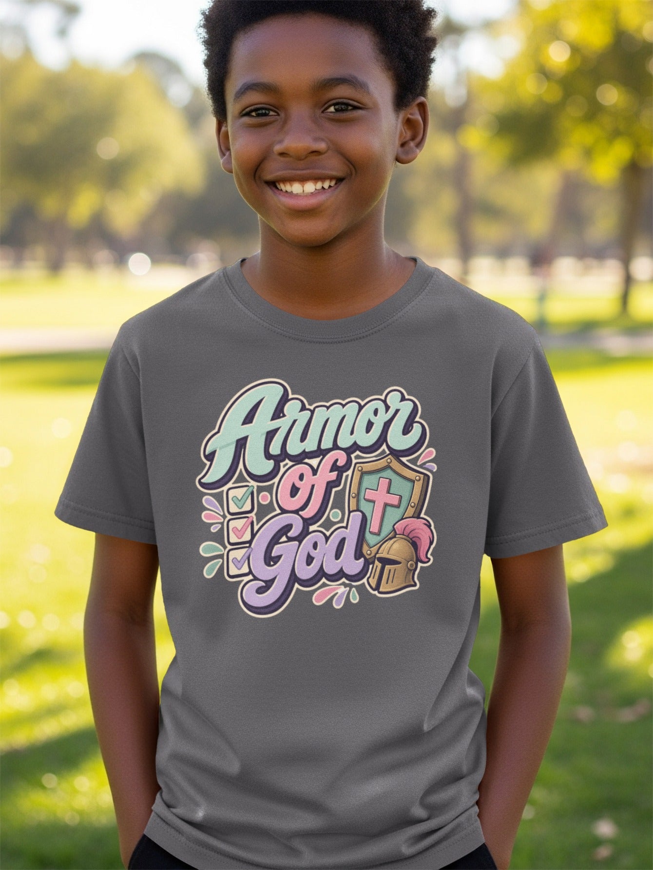 Dark grey t-shirt with "Armor of God" text, shield, cross, helmet, and checkmarks.