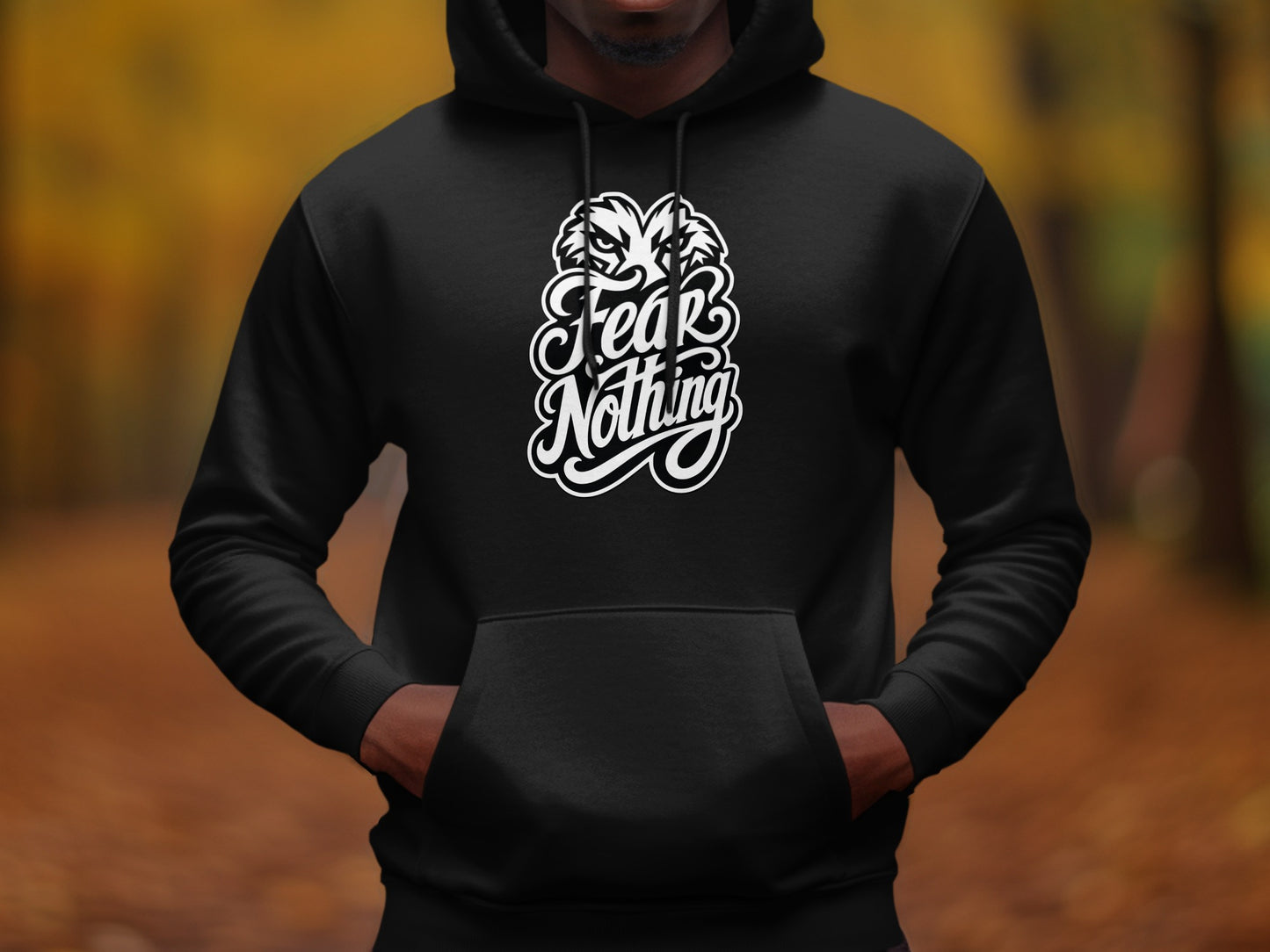 Black hoodie with white "Fear Nothing" text and lion graphics on chest.