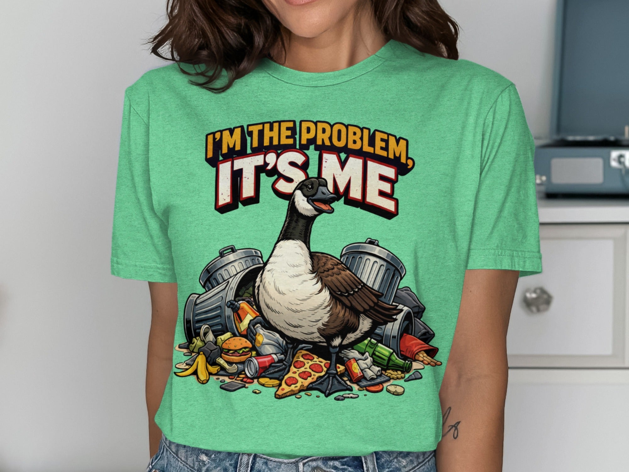 Goose sitting on trash with text "I'M THE PROBLEM, IT'S ME".