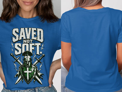 Blue t-shirt with "SAVED NOT SOFT" text and knight's helmet, shield, and swords design.