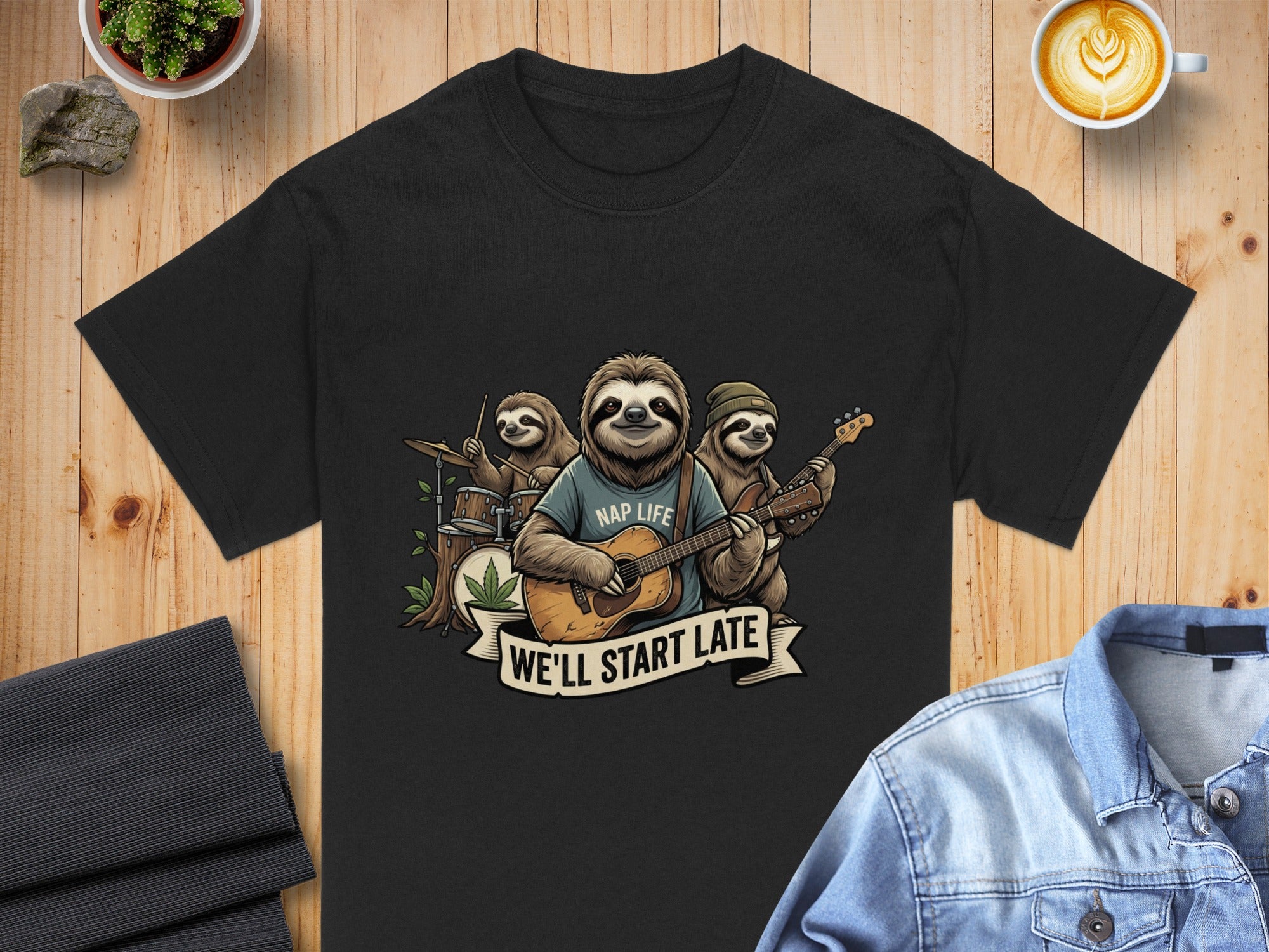 Three sloths play instruments with text "NAP LIFE" and "WE'LL START LATE."