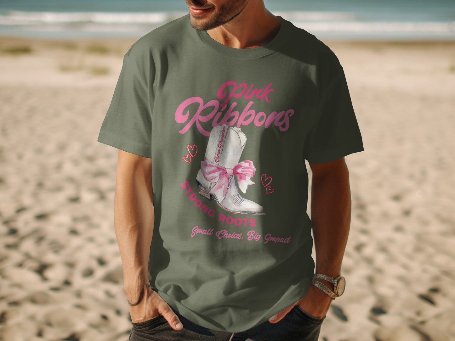 Green t-shirt with pink "Pink Ribbons" and cowboy boot graphic.