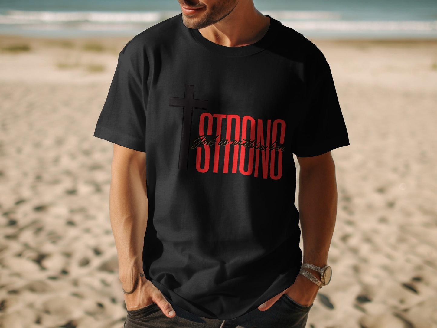 Black t-shirt with "STRONG" and cross graphic, "God is within her" text.