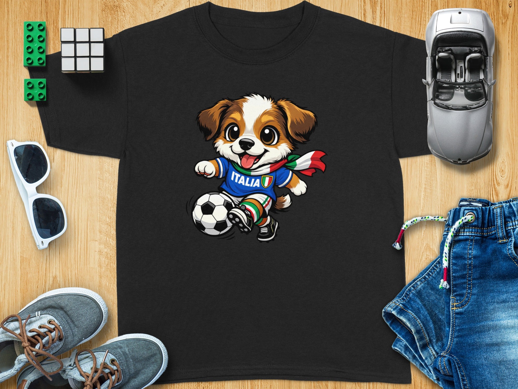 Black t-shirt featuring a cartoon dog kicking a soccer ball, wearing Italia jersey.