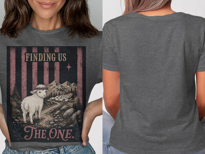 Sheep with crown of thorns, "Finding Us The One" text, mountains, and flock.