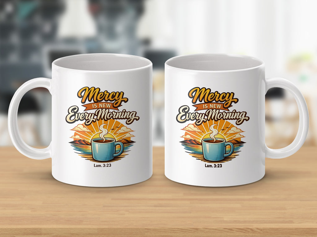 Two white mugs featuring the text "Mercy Is New Every Morning" with biblical reference Lam. 3:23.