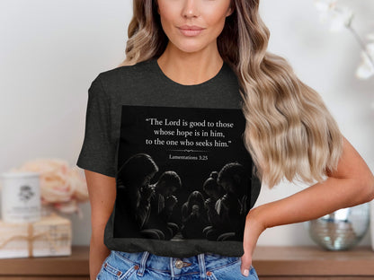 Dark grey t-shirt with text "The Lord is good to those whose hope is in him, to the one who seeks him." Lamentations 3:25