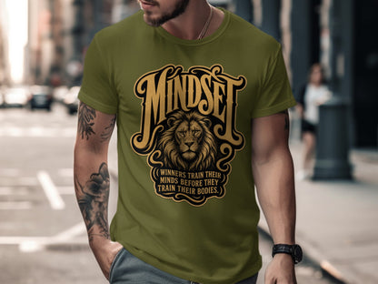 Olive green t-shirt with lion and "Mindset" text.