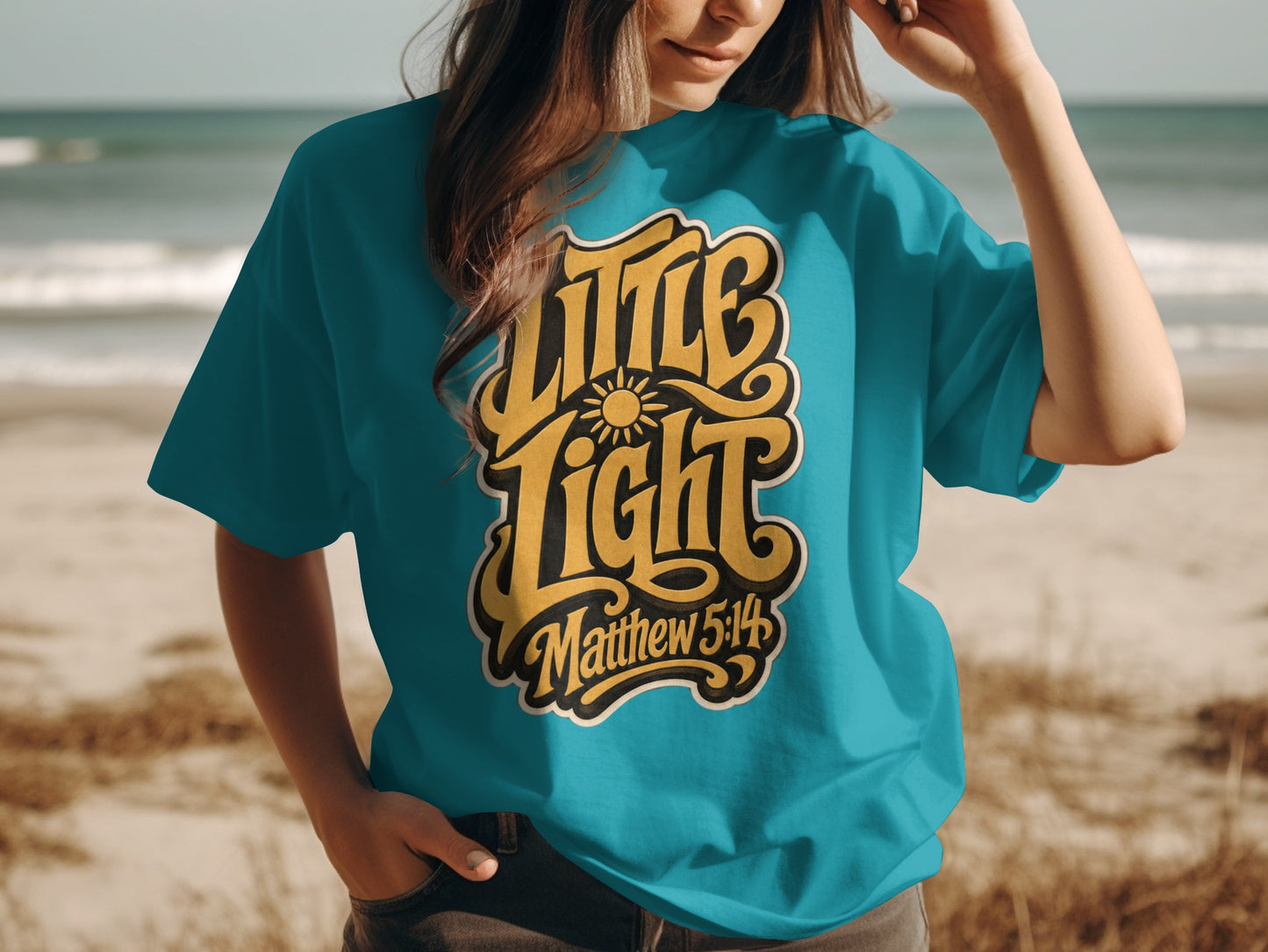Teal t-shirt with yellow "Little Light Matthew 5:14" text and sun graphic.