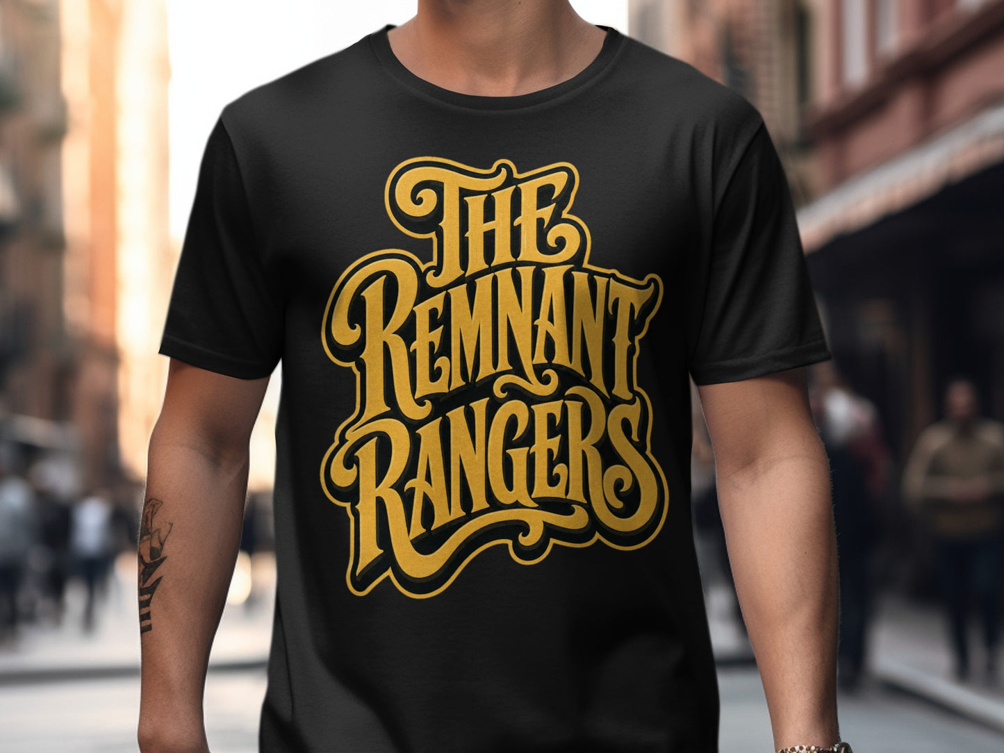 Black t-shirt with yellow "The Remnant Rangers" text graphic.