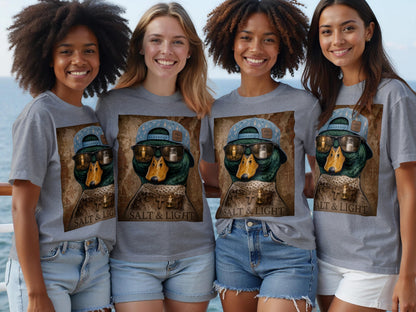 Four smiling women wear grey t-shirts with a graphic of a duck wearing a hat and sunglasses.