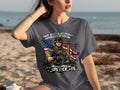 Soldier graphic with American flag and scales of justice on t-shirt.