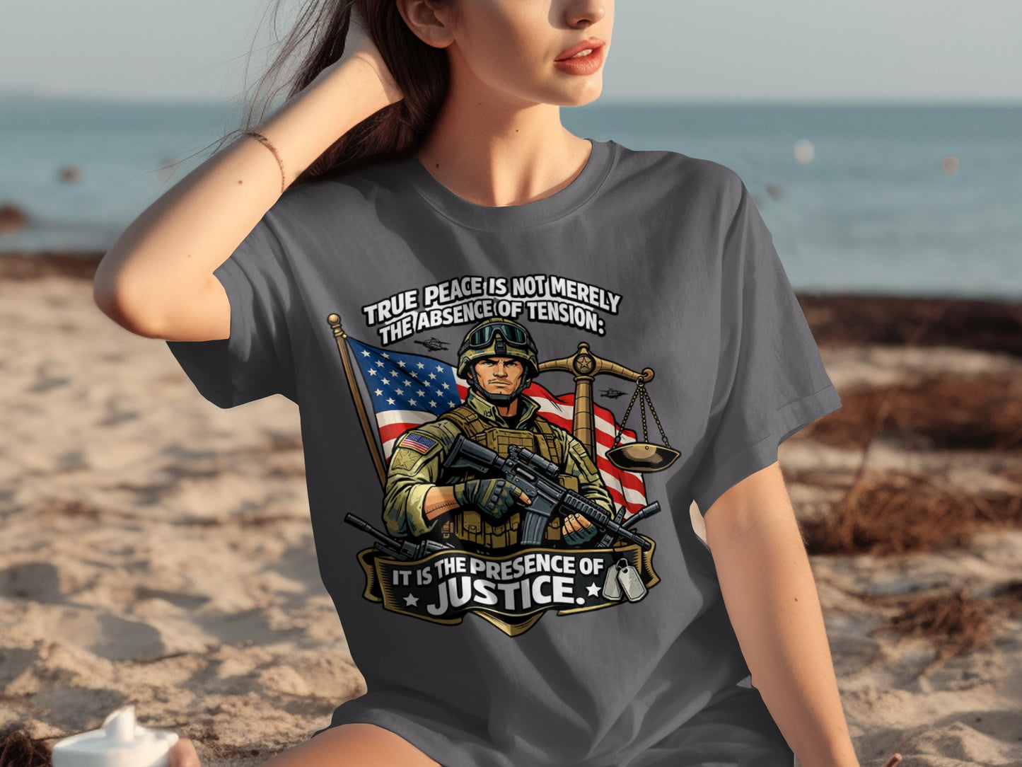 Soldier graphic with American flag and scales of justice on t-shirt.