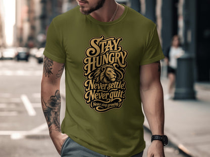 Olive green t-shirt with "Stay Hungry Never Settle Never Quit" text and lion graphic.