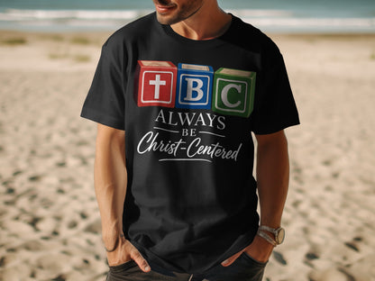 Black t-shirt with ABC blocks: Cross, B, C, and text "ALWAYS BE Christ-Centered."