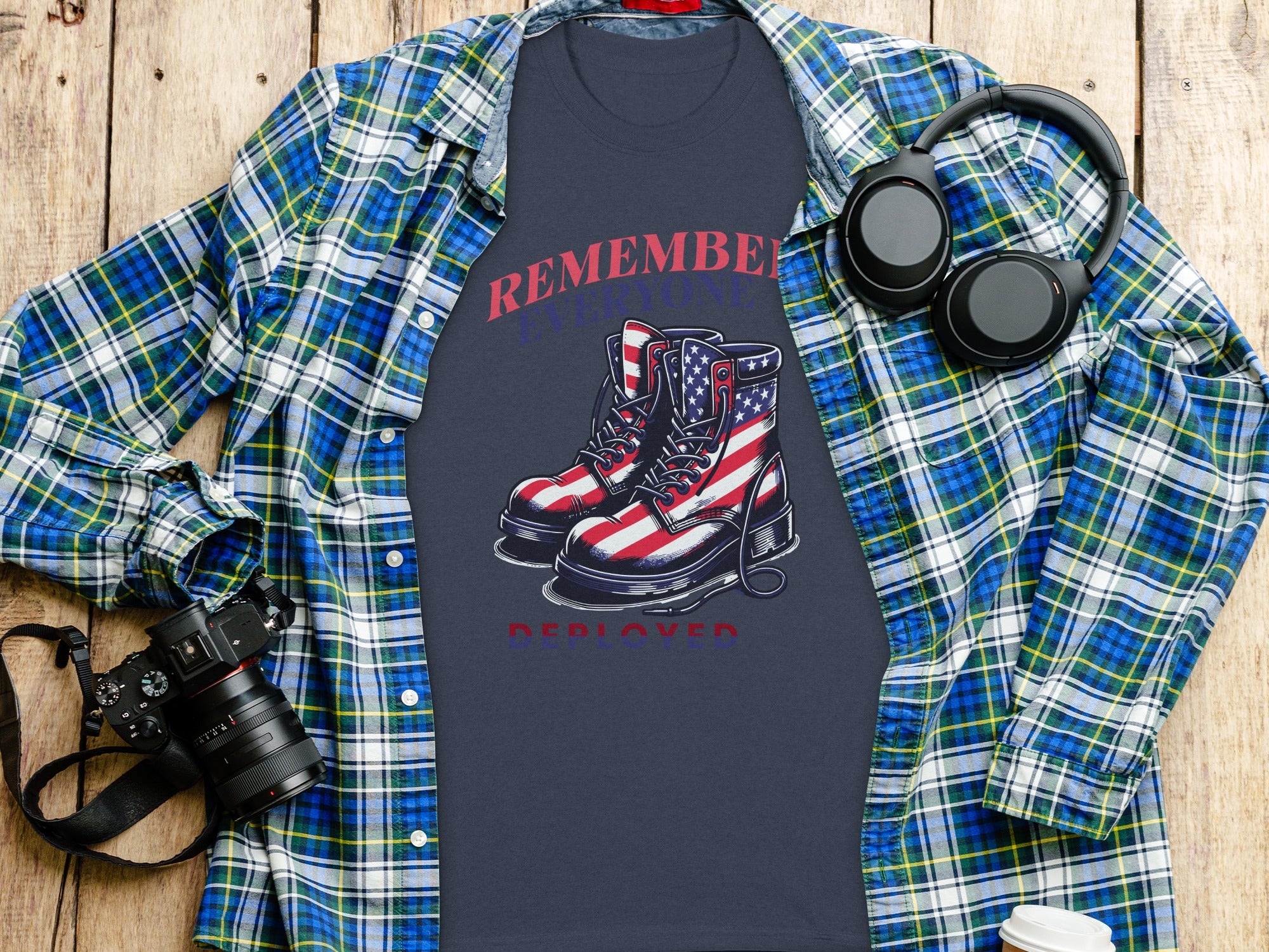 T-shirt with American flag boots and "Remember Everyone Deployed" text.