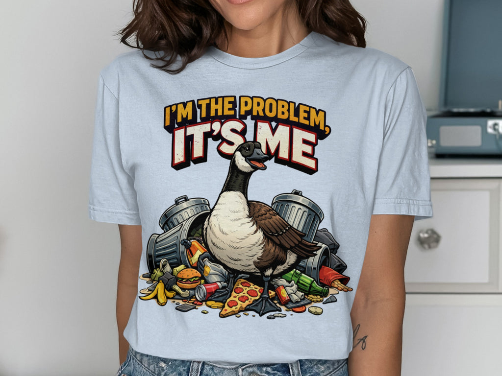 Goose in trash with text that says "I'M THE PROBLEM, IT'S ME".