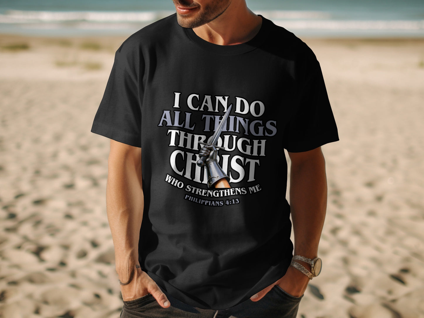 Black t-shirt with text "I CAN DO ALL THINGS THROUGH CHRIST" and "PHILIPPIANS 4:13".