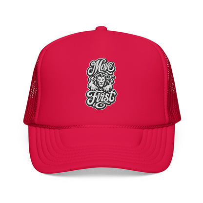 Red trucker hat with embroidered lion and "Move First" text.