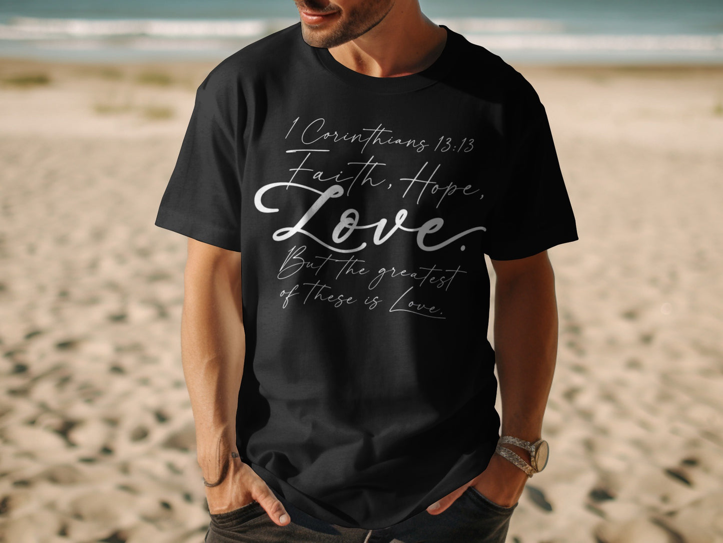 Black t-shirt with "1 Corinthians 13:13 Faith, Hope, Love. But the greatest of these is Love."