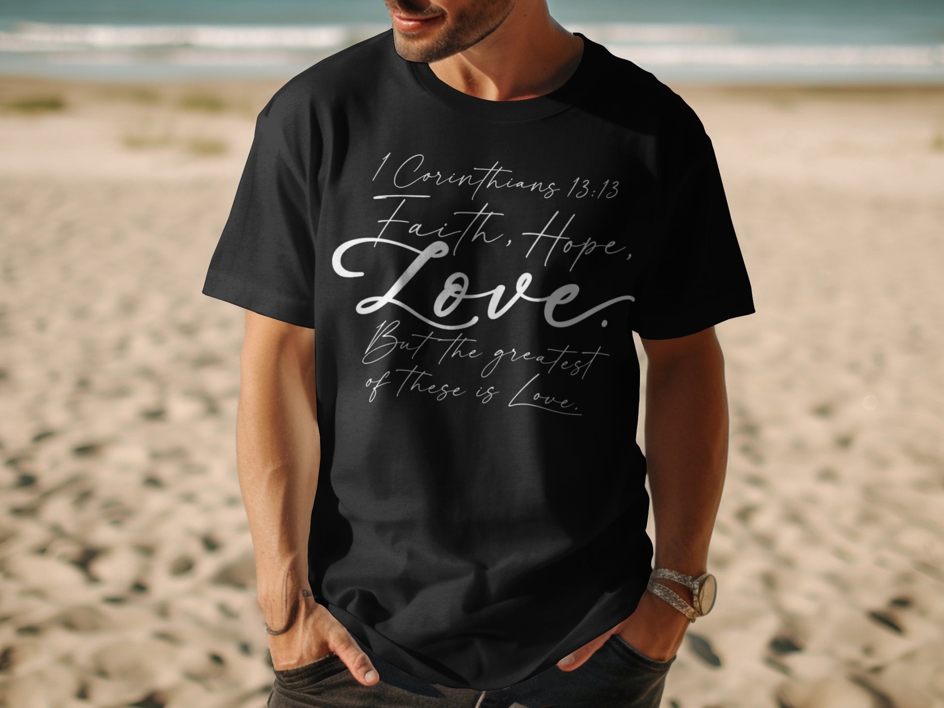 Black t-shirt with "1 Corinthians 13:13 Faith, Hope, Love. But the greatest of these is Love."