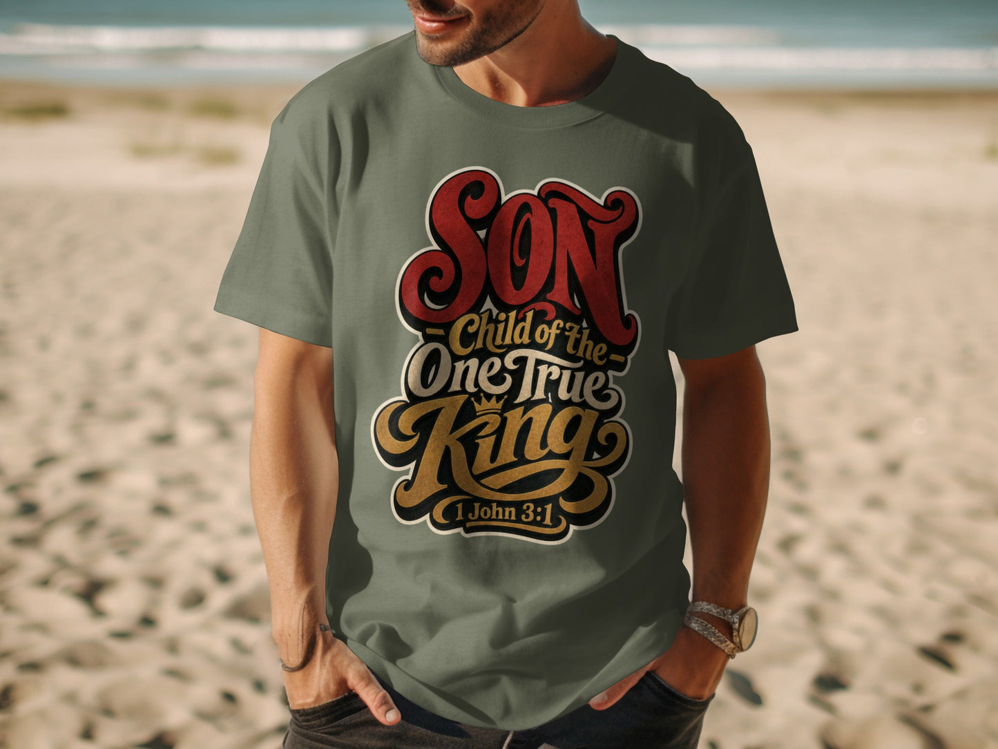 Green t-shirt with graphic reading "Son, Child of the One True King" and "1 John 3:1".