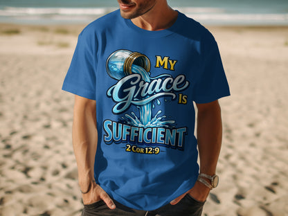 Blue t-shirt with "My Grace Is Sufficient" and "2 Cor 12:9" text and water graphic.