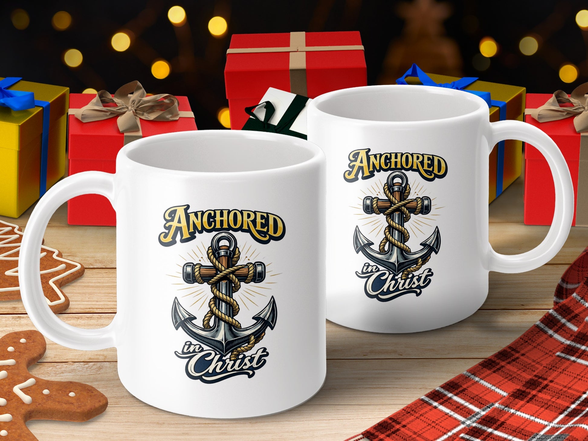 Two white mugs with "Anchored in Christ" and anchor cross design, with gifts and cookies.